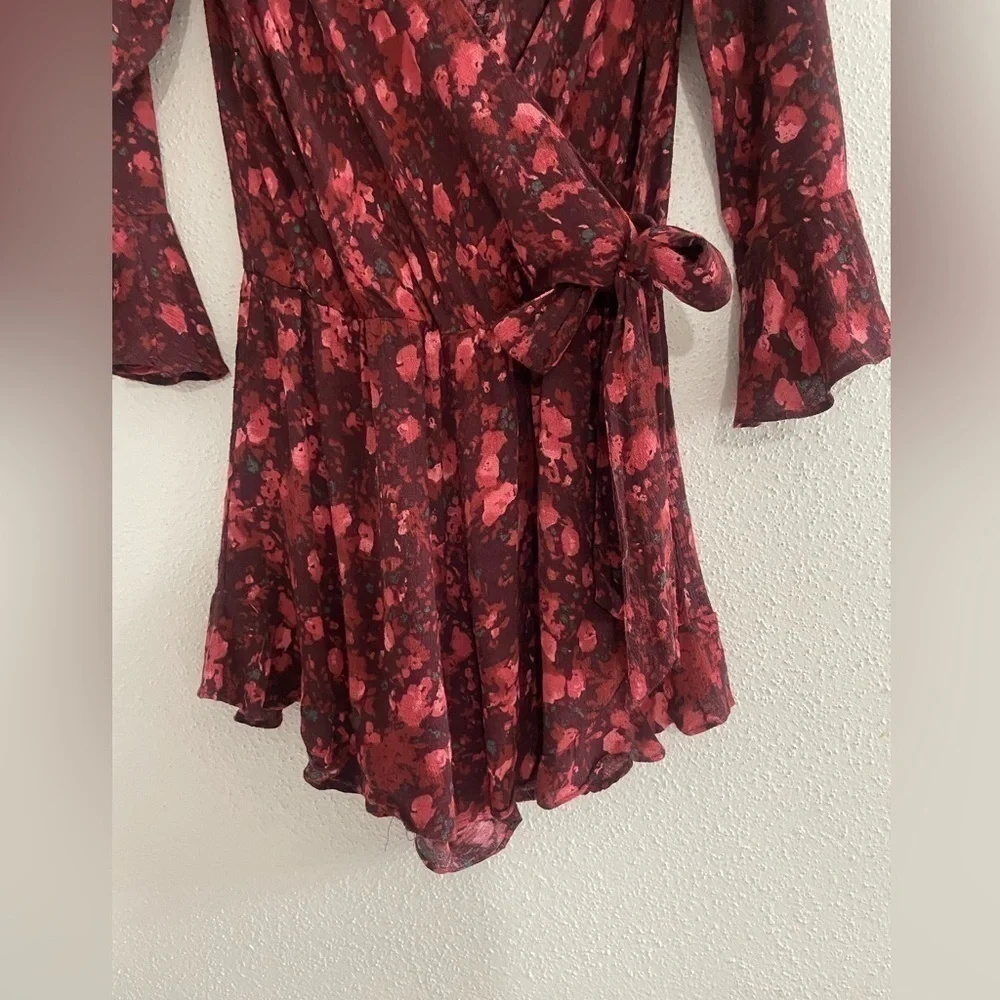 Free People All The Right Ruffles in Wild Moon Floral Romper Size XS OB397455.
